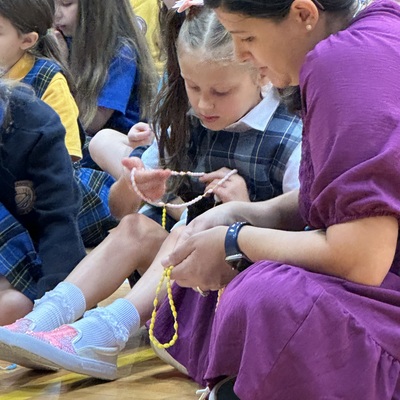 Student learn different forms of prayer including, formal prayers, rosaries, and novenas.