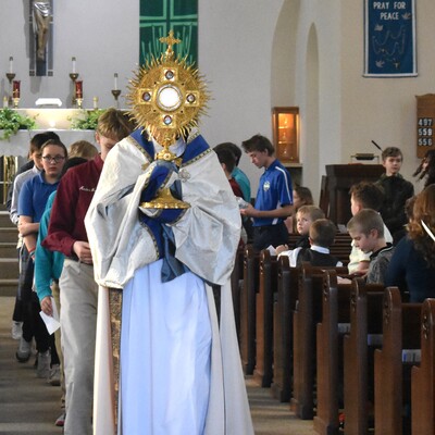 Students have the opportunity to participate in Eucharistic Processions and Adoration